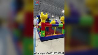 Красочный замок-домик с развлечениями на горках